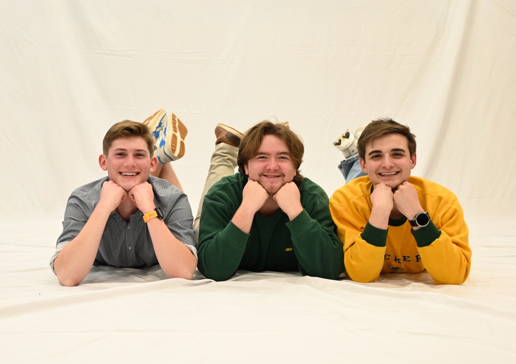 All three members of the band posing